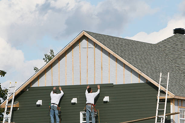 Professional Siding technician working in Capron, VA